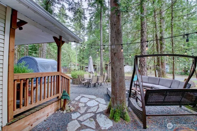 a view of a porch with furniture