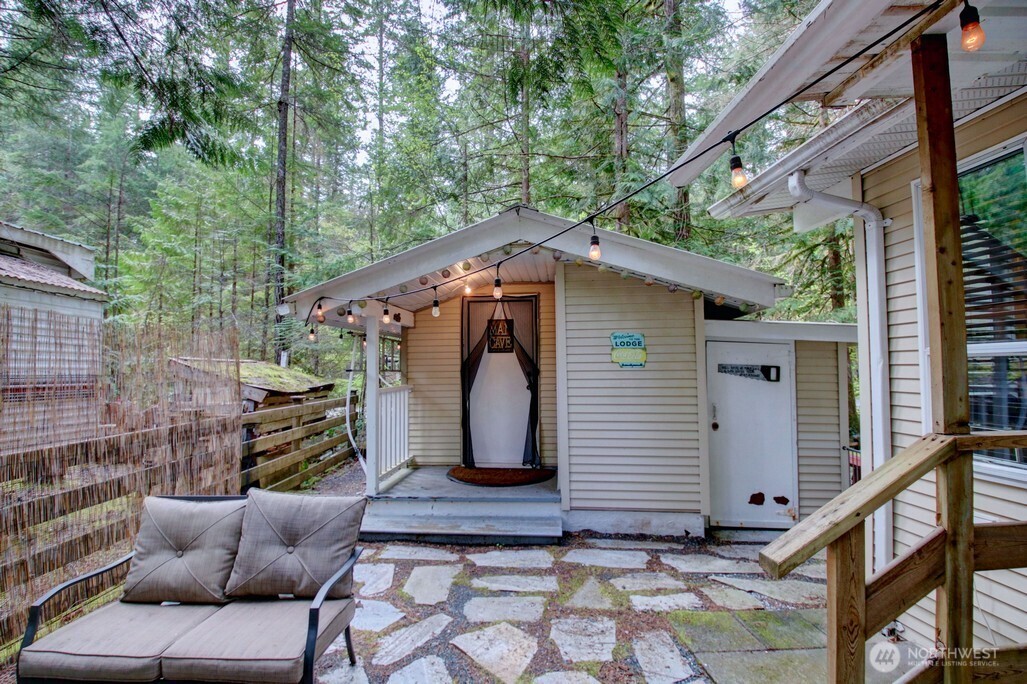 3-2 Wilderness Way Maple Falls, WA 98266 - Photo 27 of 39 a view of backyard with outdoor seating and stairs