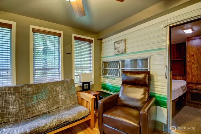 a living room with furniture and a window