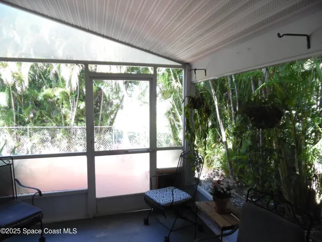 a view of a chairs in patio