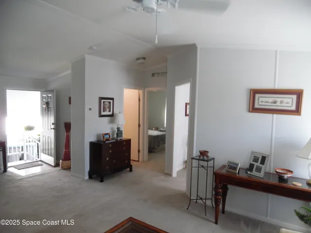 a view of a livingroom with couch and furniture