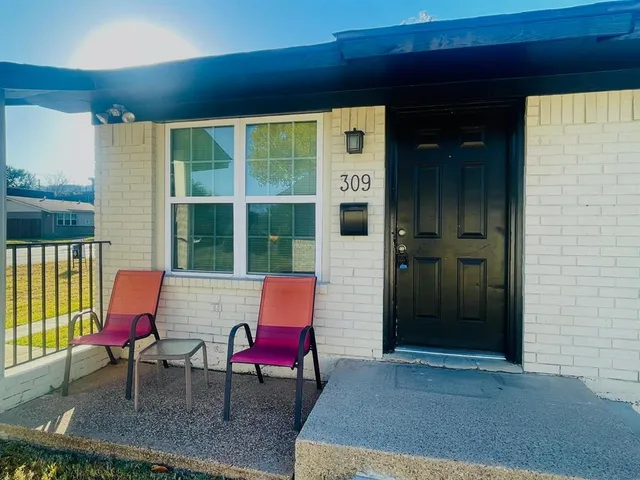 a building outdoor space with patio furniture