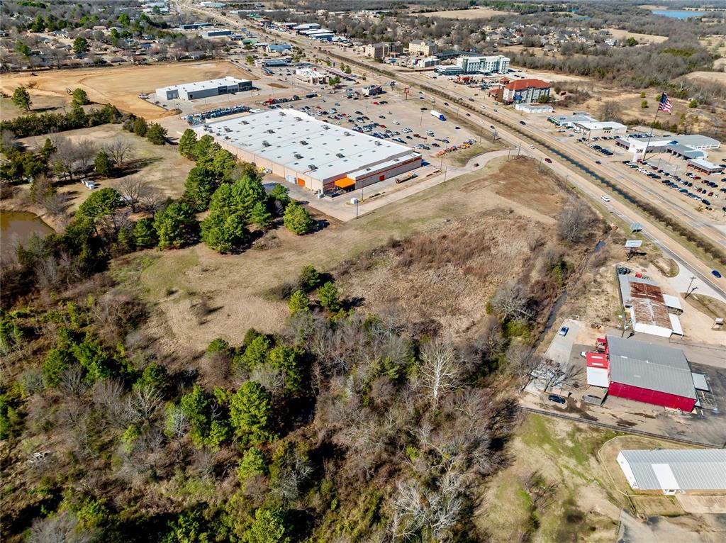 3200 Northeast Loop 286 Paris, TX 75460 - Photo 18 of 28 an aerial view of residential houses with outdoor space