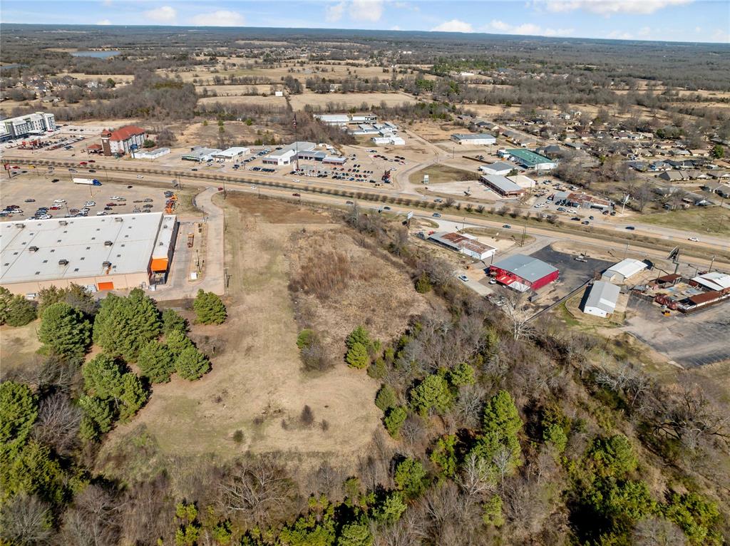 3200 Northeast Loop 286 Paris, TX 75460 - Photo 19 of 28 an aerial view of residential houses with outdoor space