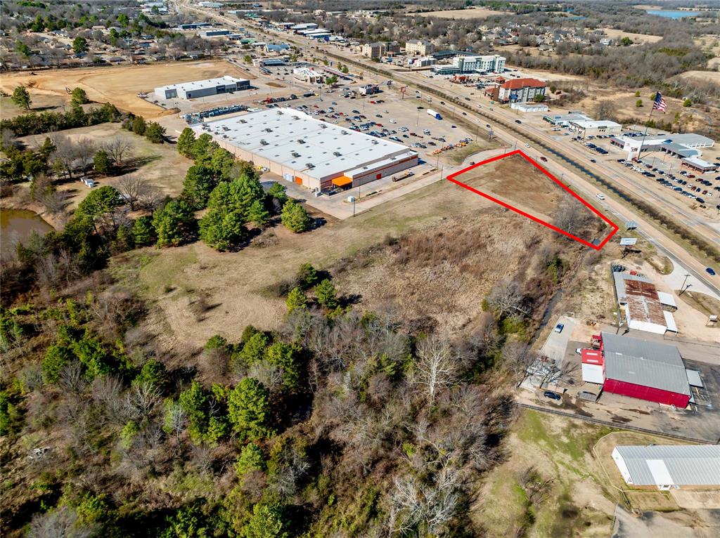 3200 Northeast Loop 286 Paris, TX 75460 - Photo 2 of 28 an aerial view of residential houses with outdoor space