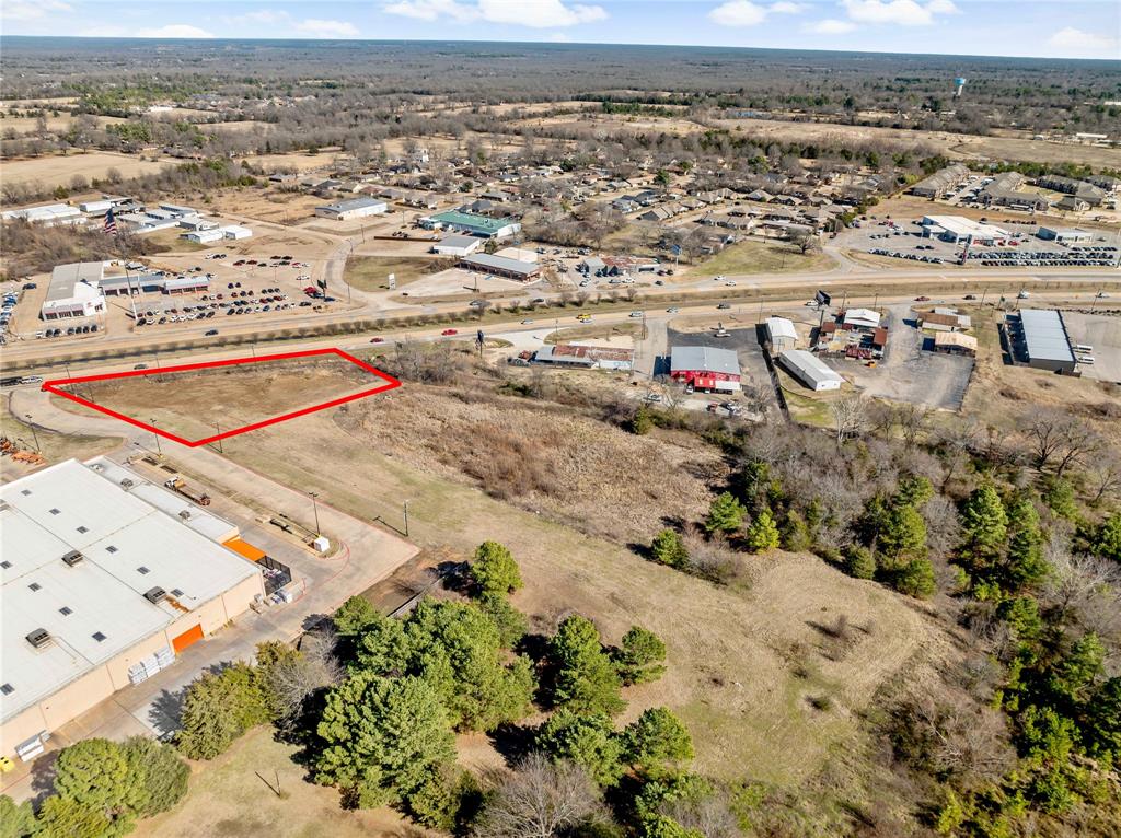 3200 Northeast Loop 286 Paris, TX 75460 - Photo 21 of 28 an aerial view of beach and residential houses with outdoor space