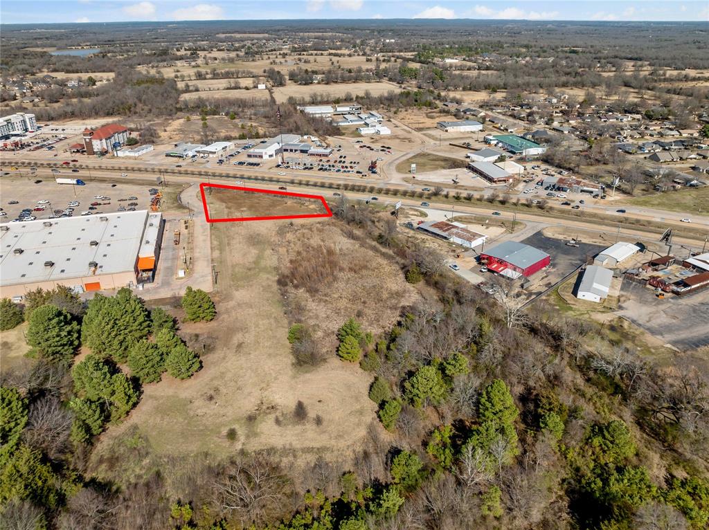 3200 Northeast Loop 286 Paris, TX 75460 - Photo 5 of 28 an aerial view of residential houses with outdoor space