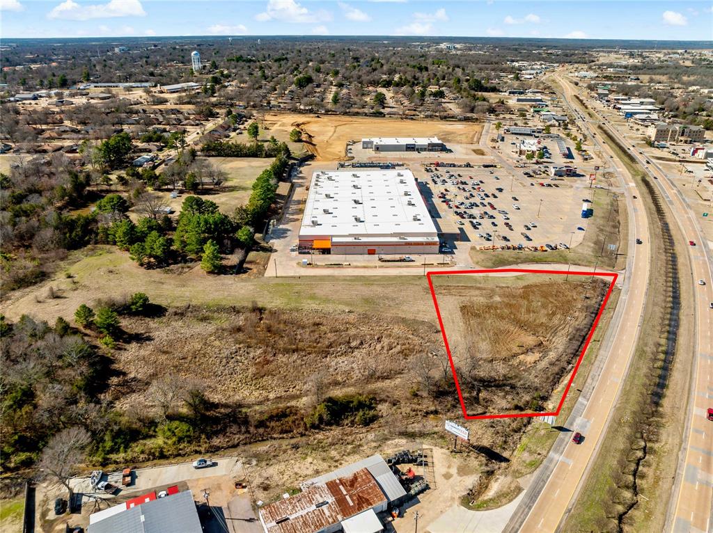 3200 Northeast Loop 286 Paris, TX 75460 - Photo 8 of 28 an aerial view of residential houses with outdoor space