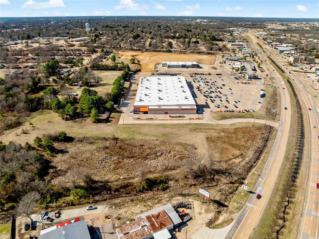 3200 Northeast Loop 286 Paris, TX 75460 - Photo 9 of 28 an aerial view of residential houses with outdoor space