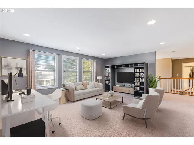 a living room with furniture large window and flat screen tv