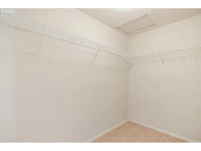 a view of a room with racks on the wall