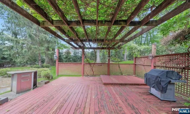 a view of balcony with deck and outdoor space