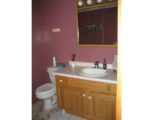22 Albion Road Billerica, MA 01821 - Photo 13 of 26 a bathroom with a toilet sink and mirror