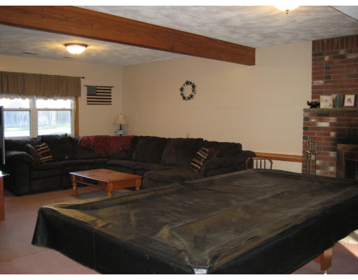 22 Albion Road Billerica, MA 01821 - Photo 18 of 26 a living room with furniture