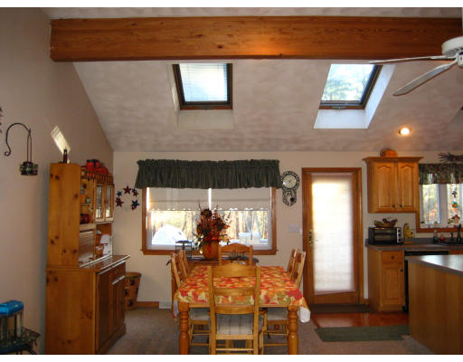 22 Albion Road Billerica, MA 01821 - Photo 3 of 26 a view of a dining room with furniture