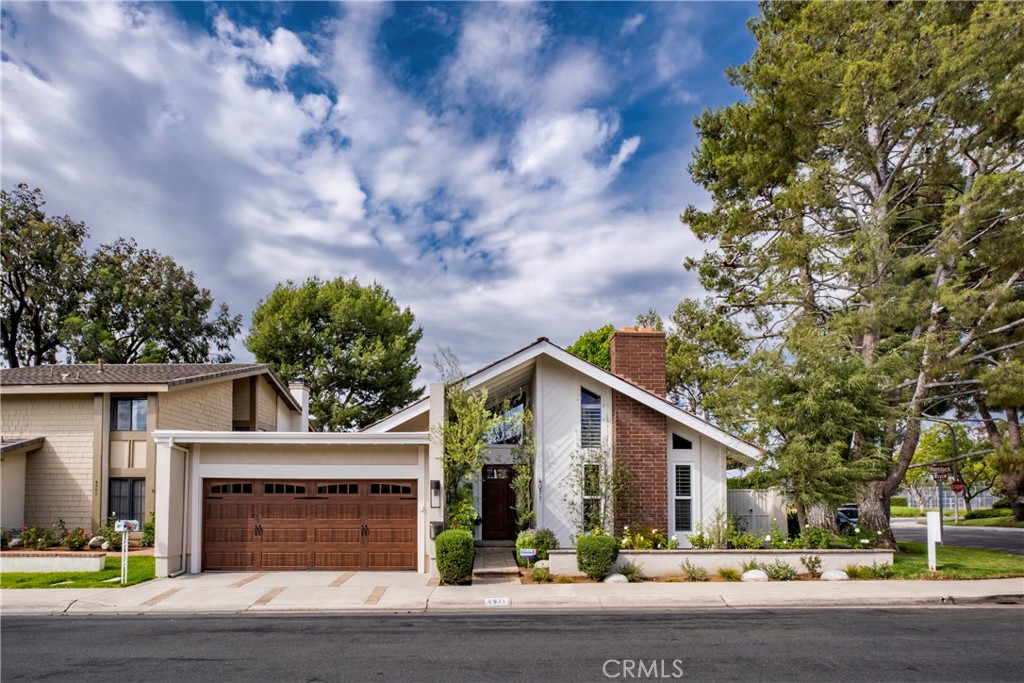 4971 Hemlock Irvine, CA 92612 - Photo 1 of 1 a front view of a house with a yard