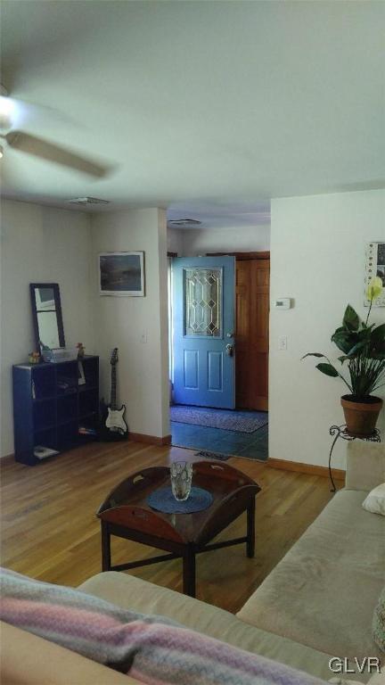 1412 Kroucher Road Stroudsburg, PA 18360 - Photo 14 of 40 a living room with furniture and a potted plant