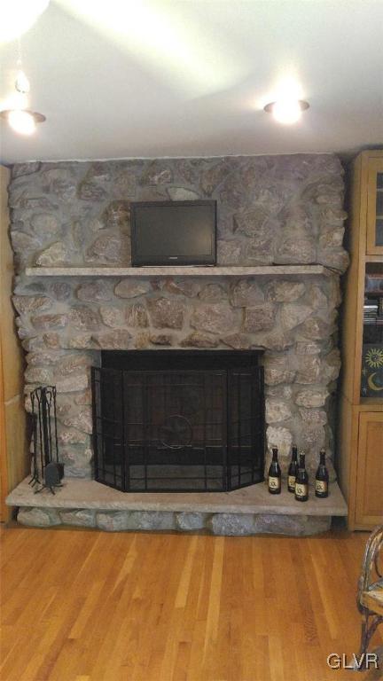 1412 Kroucher Road Stroudsburg, PA 18360 - Photo 15 of 40 a view of a living room with a fireplace
