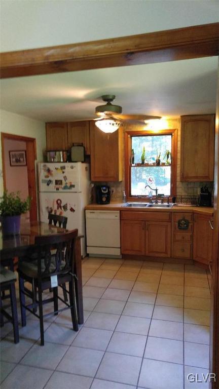 1412 Kroucher Road Stroudsburg, PA 18360 - Photo 18 of 40 a kitchen with a sink a counter top space and appliances
