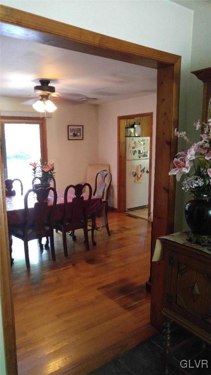 1412 Kroucher Road Stroudsburg, PA 18360 - Photo 20 of 40 a view of a dining room with furniture and wooden floor