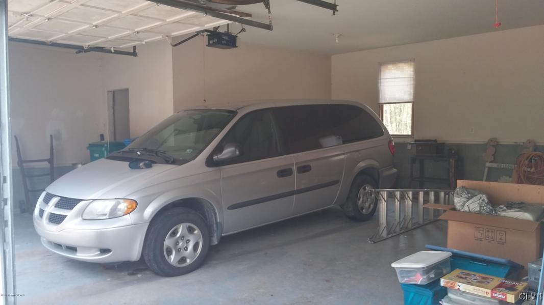 1412 Kroucher Road Stroudsburg, PA 18360 - Photo 38 of 40 a car parked in a room