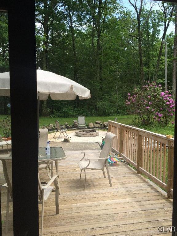 1412 Kroucher Road Stroudsburg, PA 18360 - Photo 9 of 40 a view of balcony with wooden floor and outdoor seating
