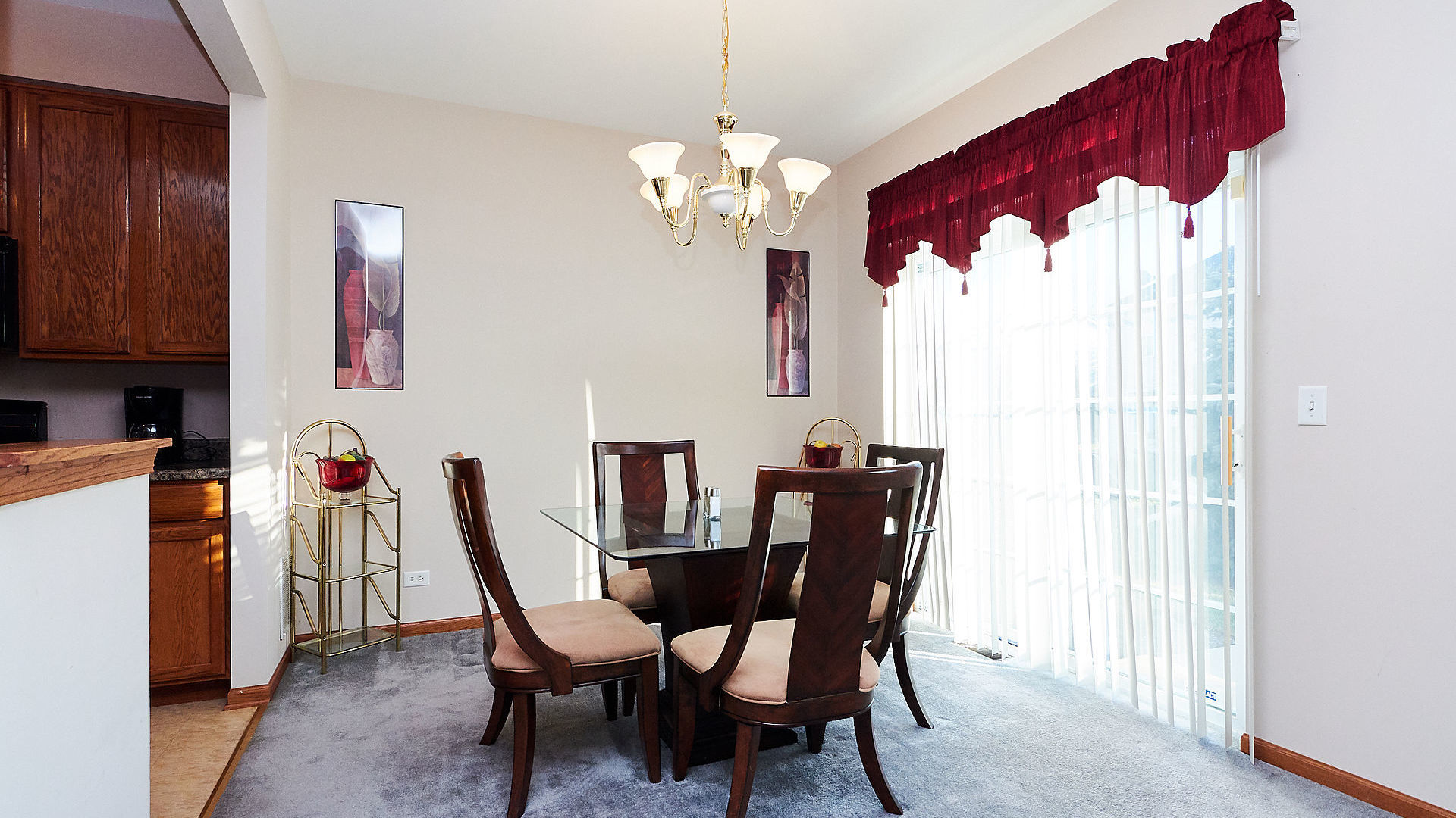 1989 West Cobblestone Road, Unit 1989 Romeoville, IL 60446 - Photo 11 of 51 a view of a dining room with furniture and chandelier