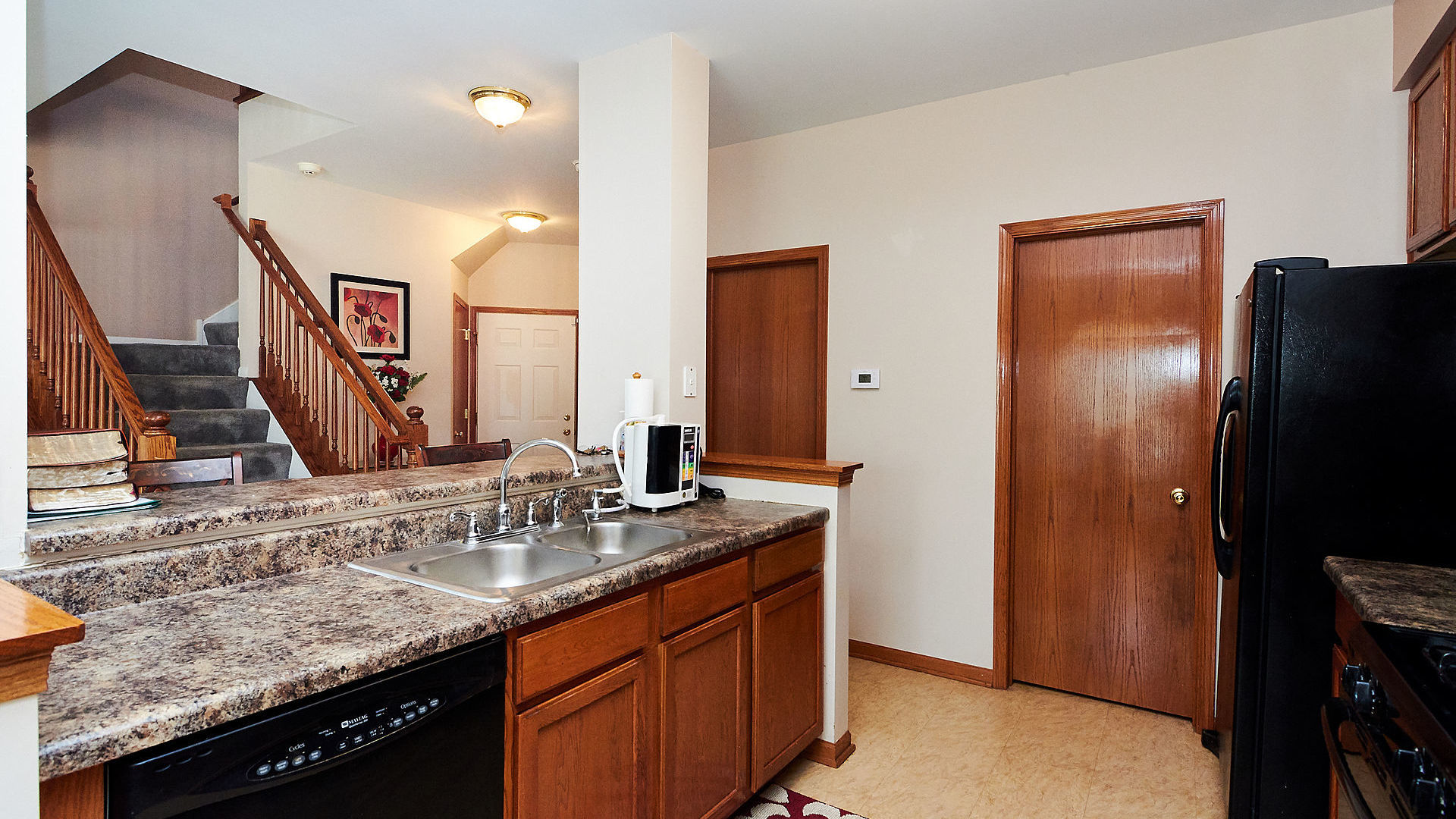 1989 West Cobblestone Road, Unit 1989 Romeoville, IL 60446 - Photo 15 of 51 a bathroom with a granite countertop double vanity sink and a mirror