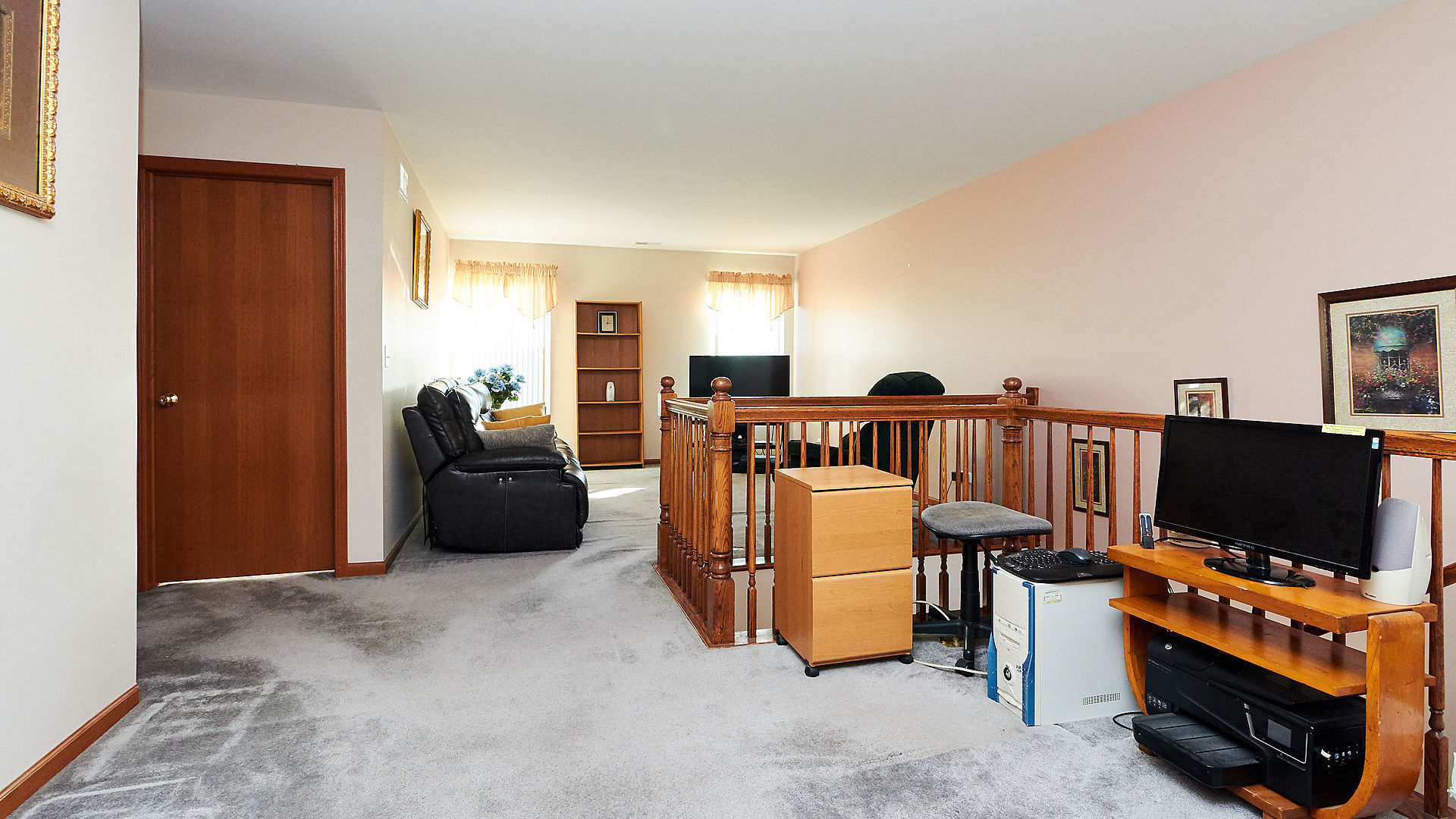 1989 West Cobblestone Road, Unit 1989 Romeoville, IL 60446 - Photo 20 of 51 a view of a livingroom with furniture and flat screen tv