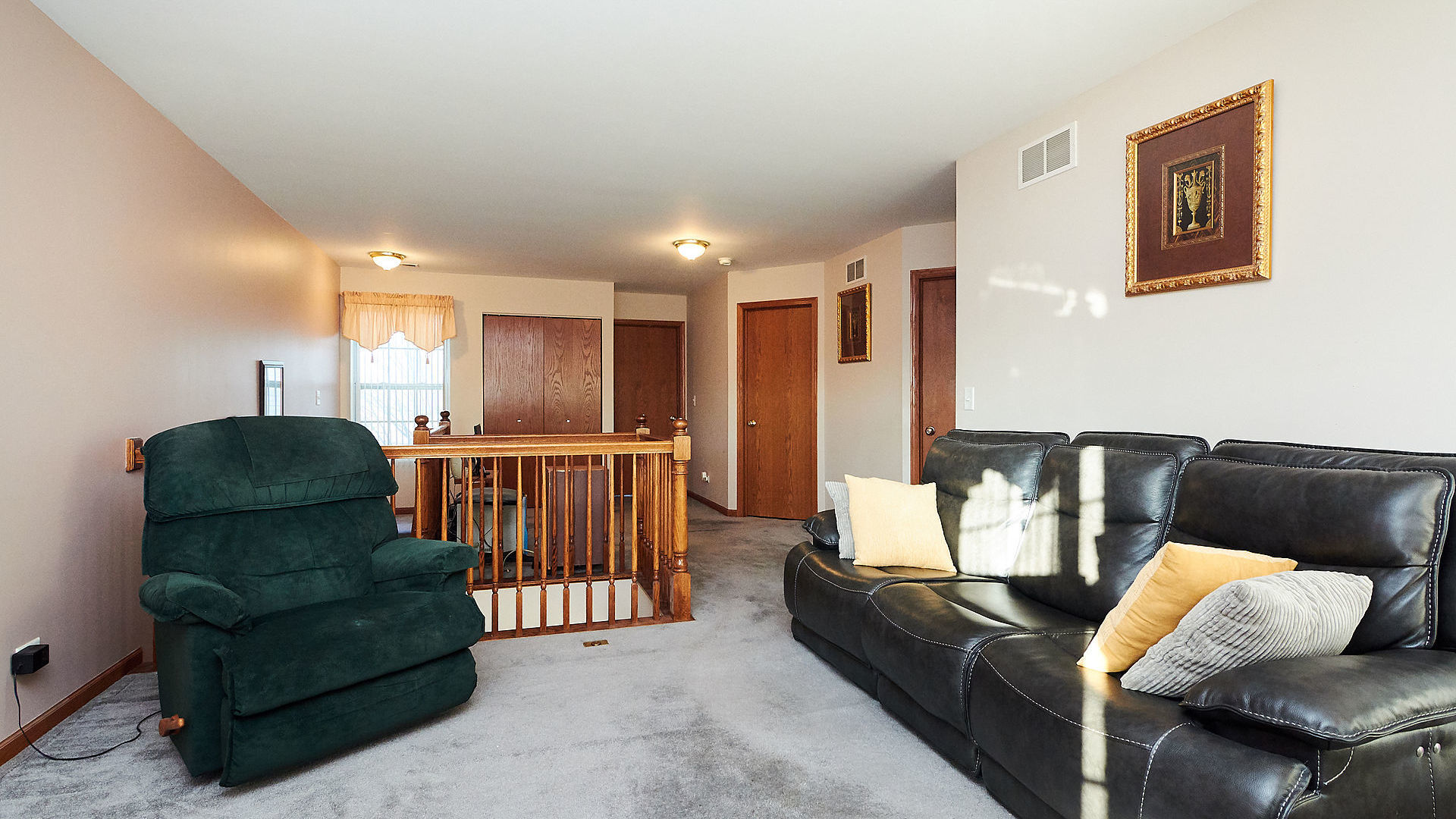 1989 West Cobblestone Road, Unit 1989 Romeoville, IL 60446 - Photo 25 of 51 a living room with furniture and a couch