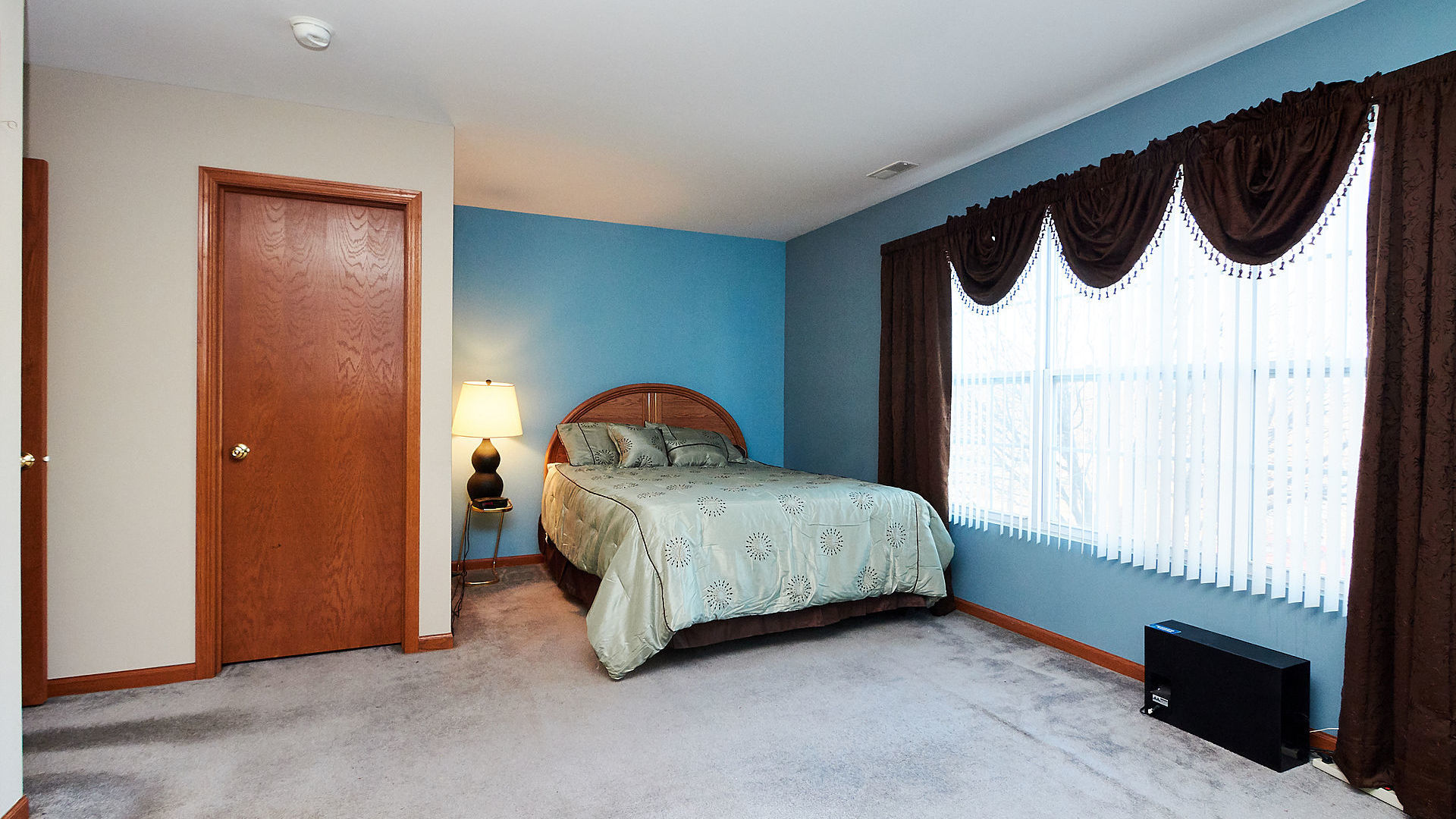 1989 West Cobblestone Road, Unit 1989 Romeoville, IL 60446 - Photo 26 of 51 a bedroom with a bed and a window
