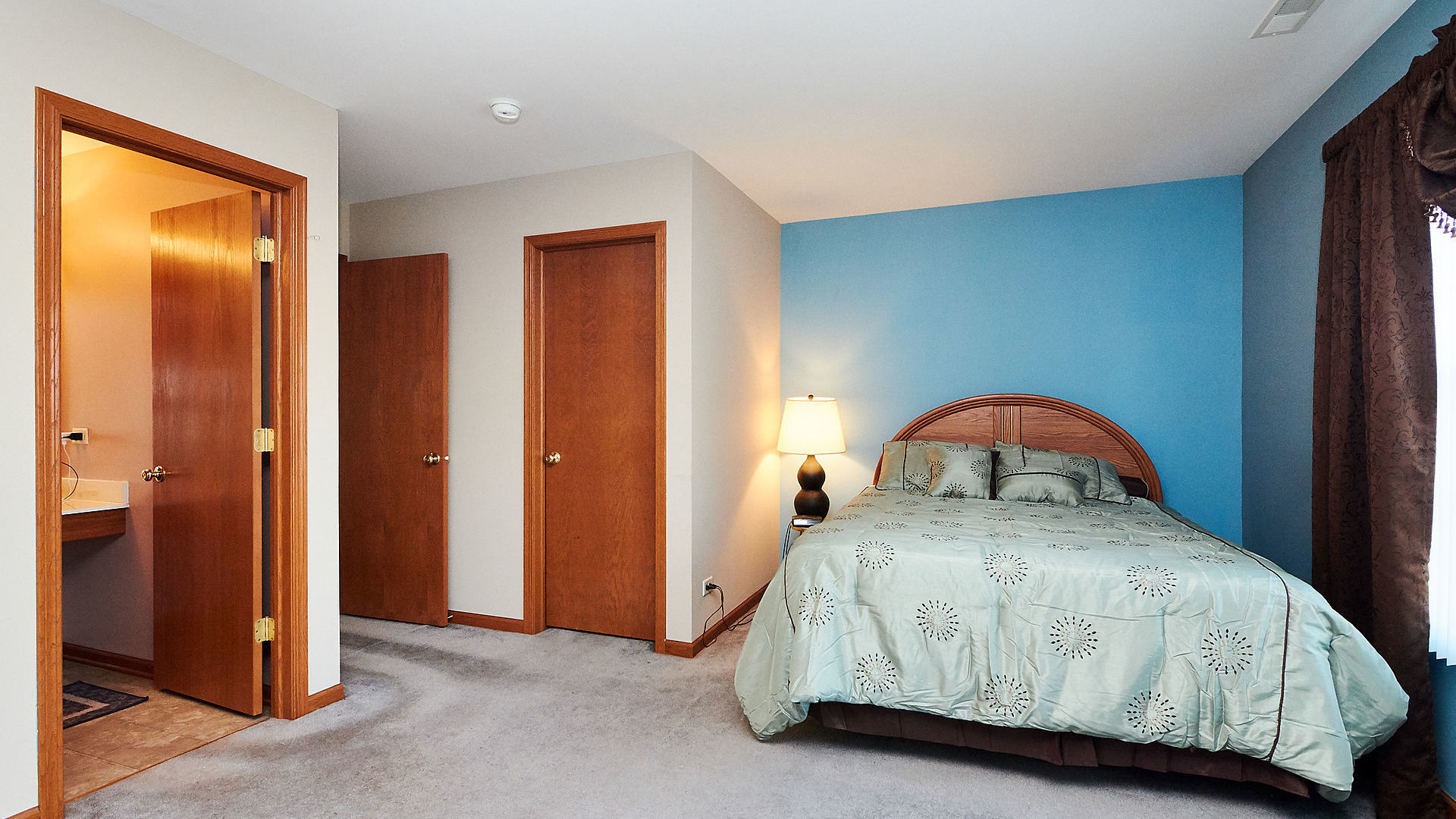 1989 West Cobblestone Road, Unit 1989 Romeoville, IL 60446 - Photo 27 of 51 a bedroom with a bed and a dresser