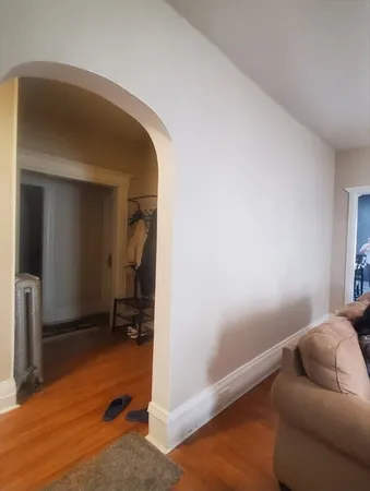 a bedroom with a bed and furniture