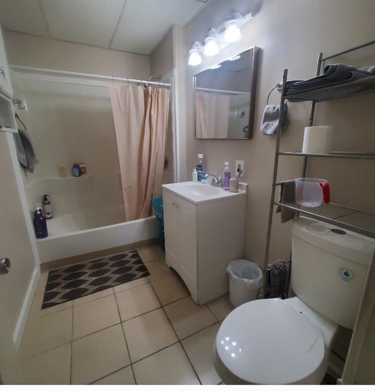50 Hollywood Street, Unit 2 Springfield, MA 01108 - Photo 6 of 6 a bathroom with a sink toilet and shower