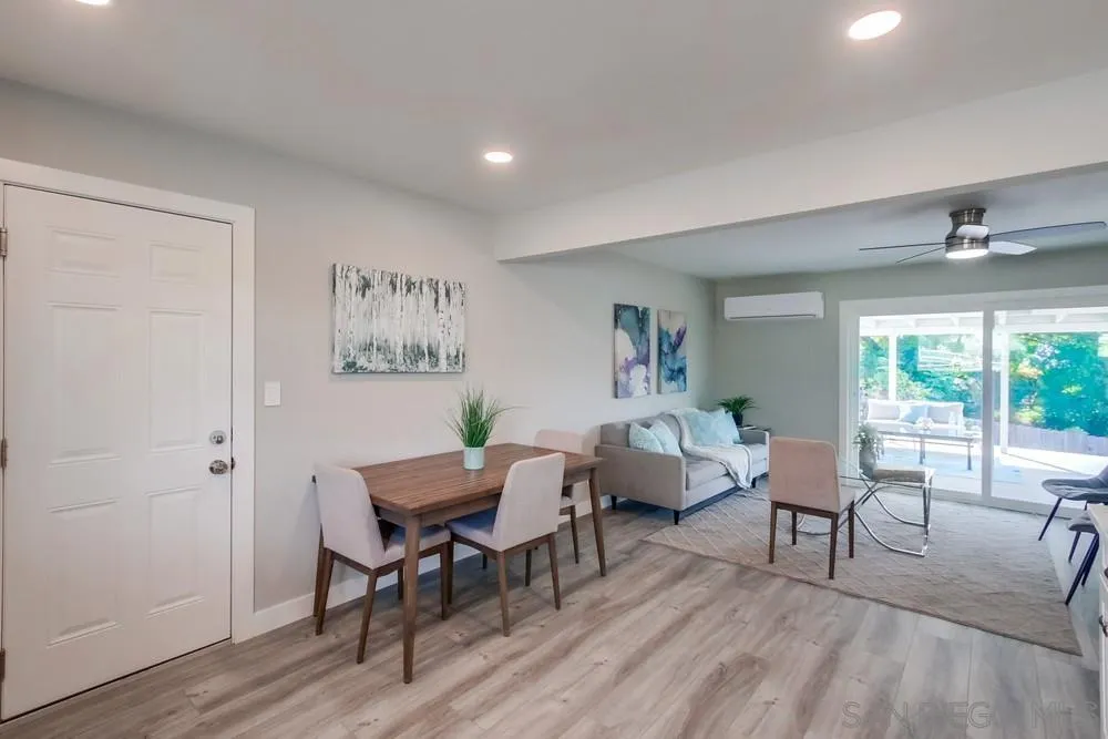 10110 Strathmore Drive Santee, CA 92071 - Photo 12 of 45 a view of a livingroom with furniture window and wooden floor