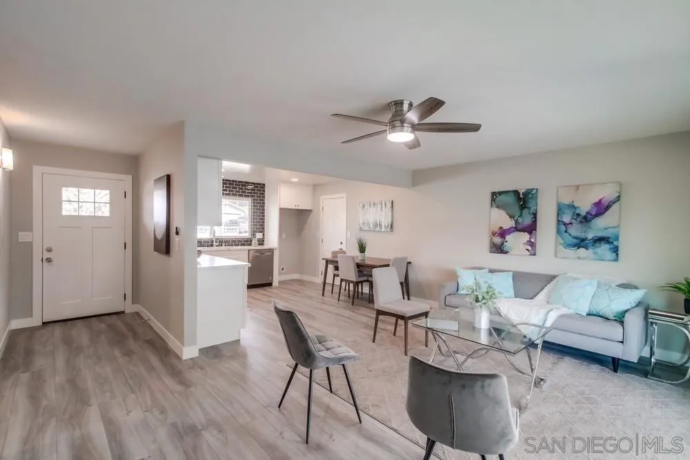 10110 Strathmore Drive Santee, CA 92071 - Photo 14 of 45 a view of a dining room with furniture and wooden floor