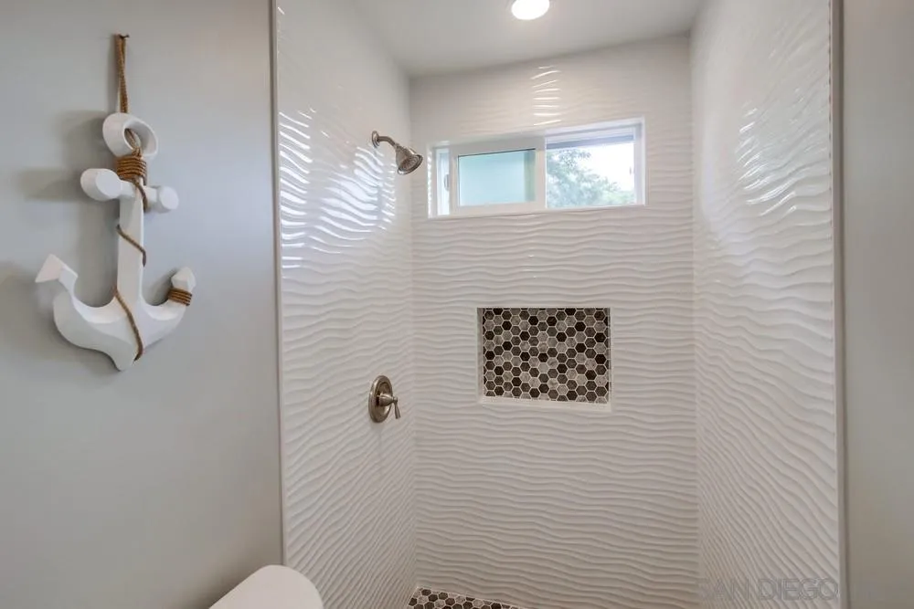 10110 Strathmore Drive Santee, CA 92071 - Photo 21 of 45 a bathroom with a shower