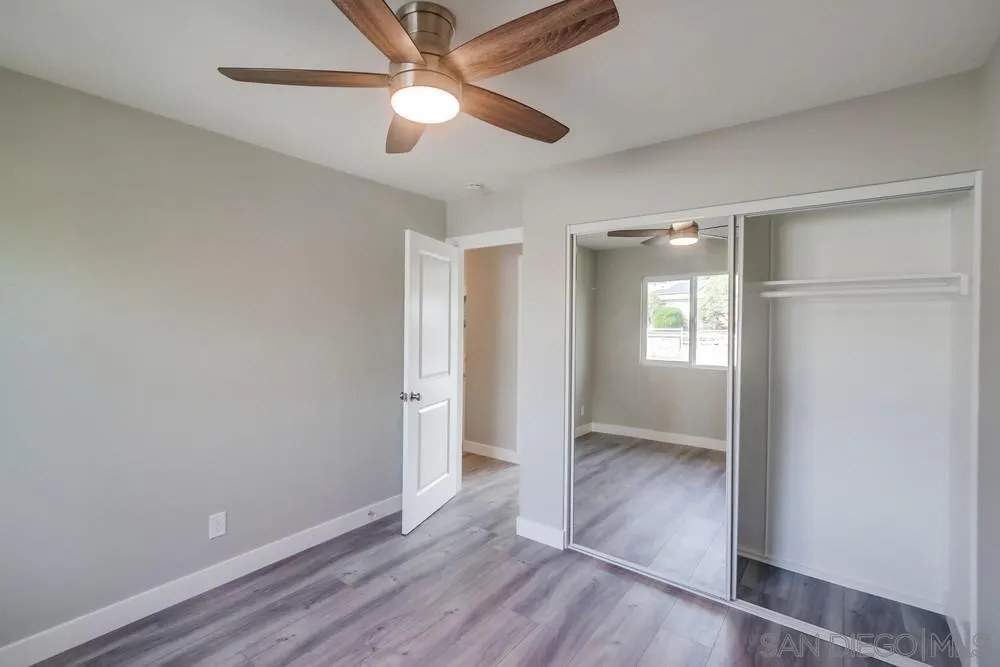 10110 Strathmore Drive Santee, CA 92071 - Photo 24 of 45 wooden floor in an empty room with a window