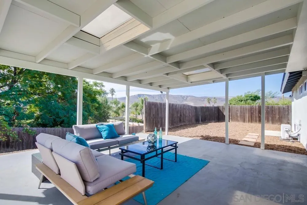 10110 Strathmore Drive Santee, CA 92071 - Photo 29 of 45 a outdoor space with patio the glass table and chairs