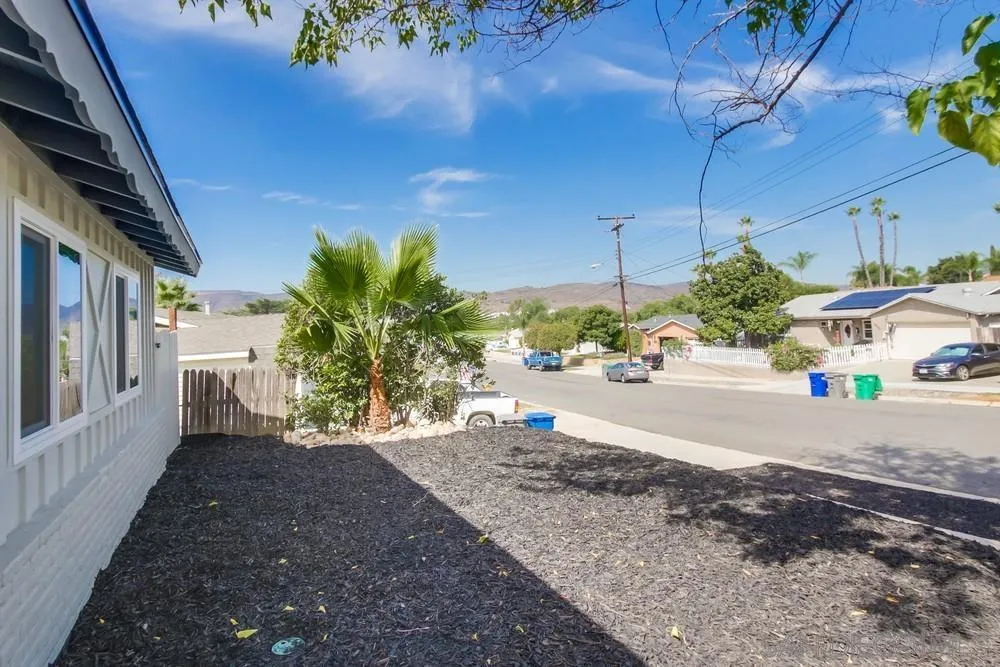 10110 Strathmore Drive Santee, CA 92071 - Photo 3 of 45 a view of a house with a street