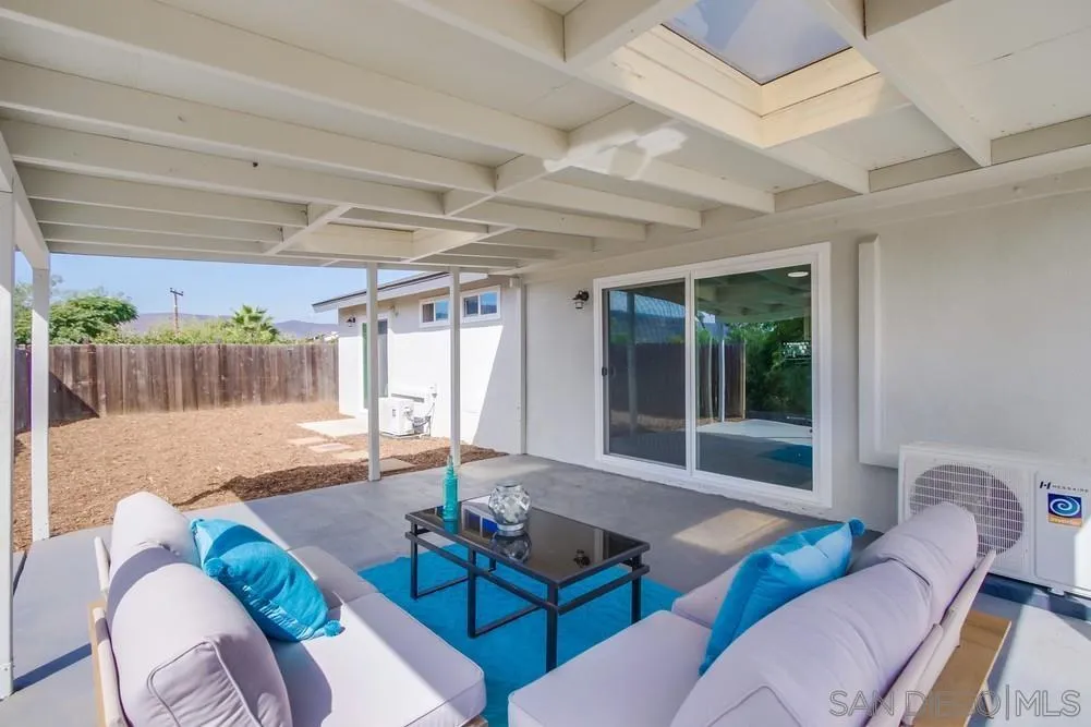 10110 Strathmore Drive Santee, CA 92071 - Photo 32 of 45 a living room with furniture and a table