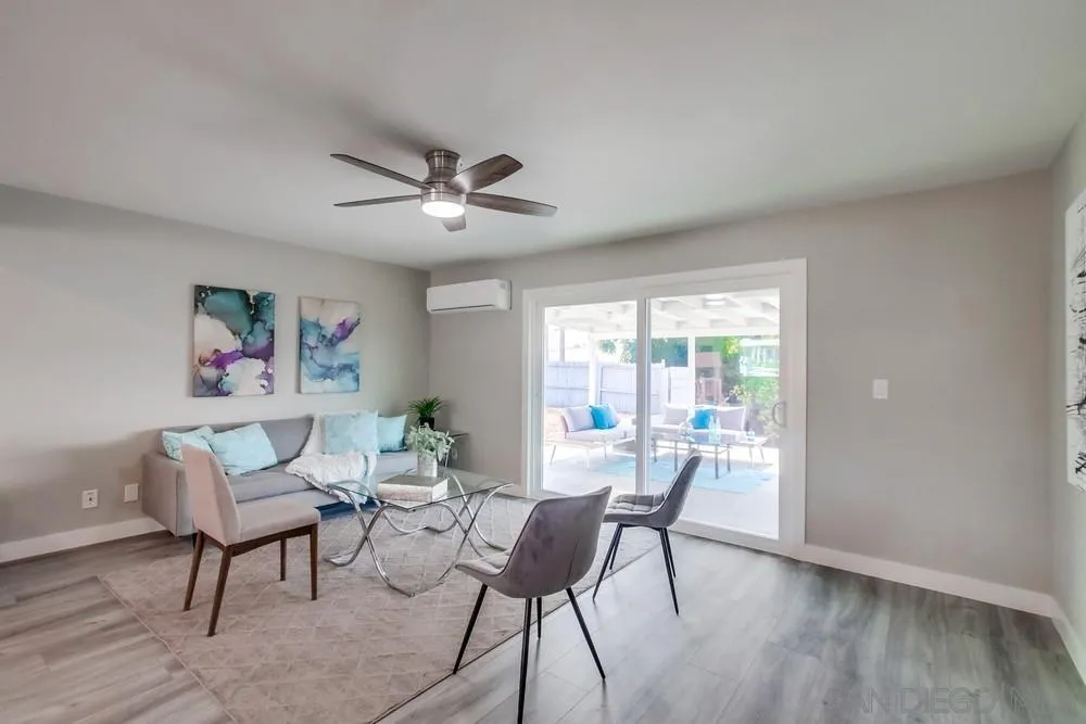 10110 Strathmore Drive Santee, CA 92071 - Photo 10 of 45 a living room with furniture and a large window