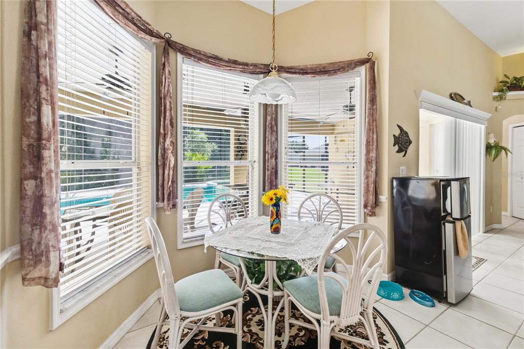 3225 Canoe Creek Road St. Cloud, FL 34772 - Photo 13 of 30 a dining room with furniture and window