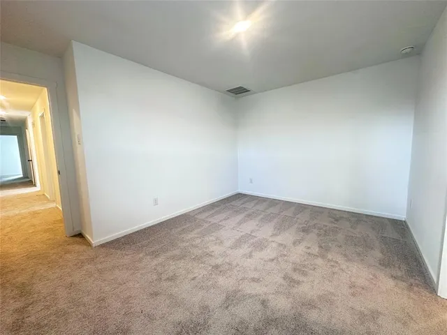 an empty room with a natural light