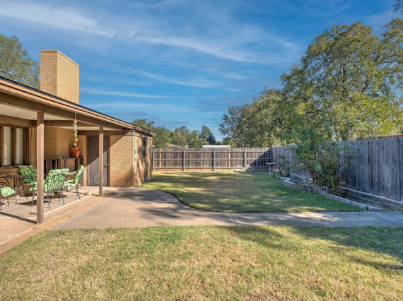 4509 62nd Street Lubbock, TX 79414 - Photo 20 of 20 a view of a house with backyard and sitting area