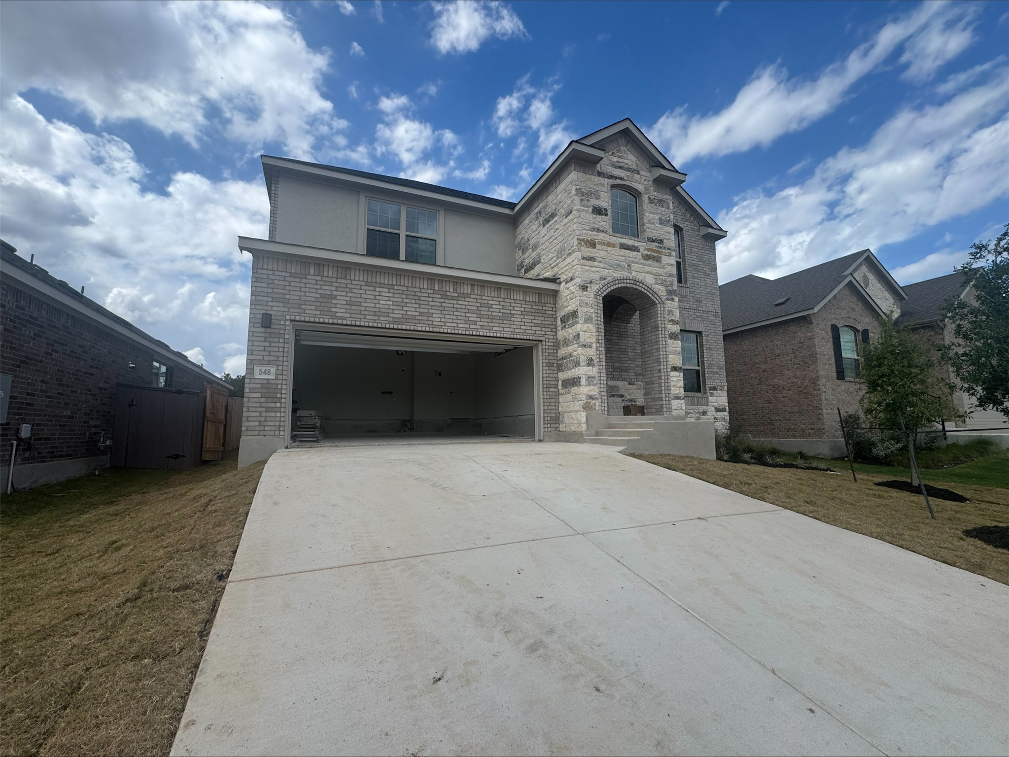 548 Tubman Drive Kyle, TX 78640 - Photo 1 of 13 a front view of a house with entryway