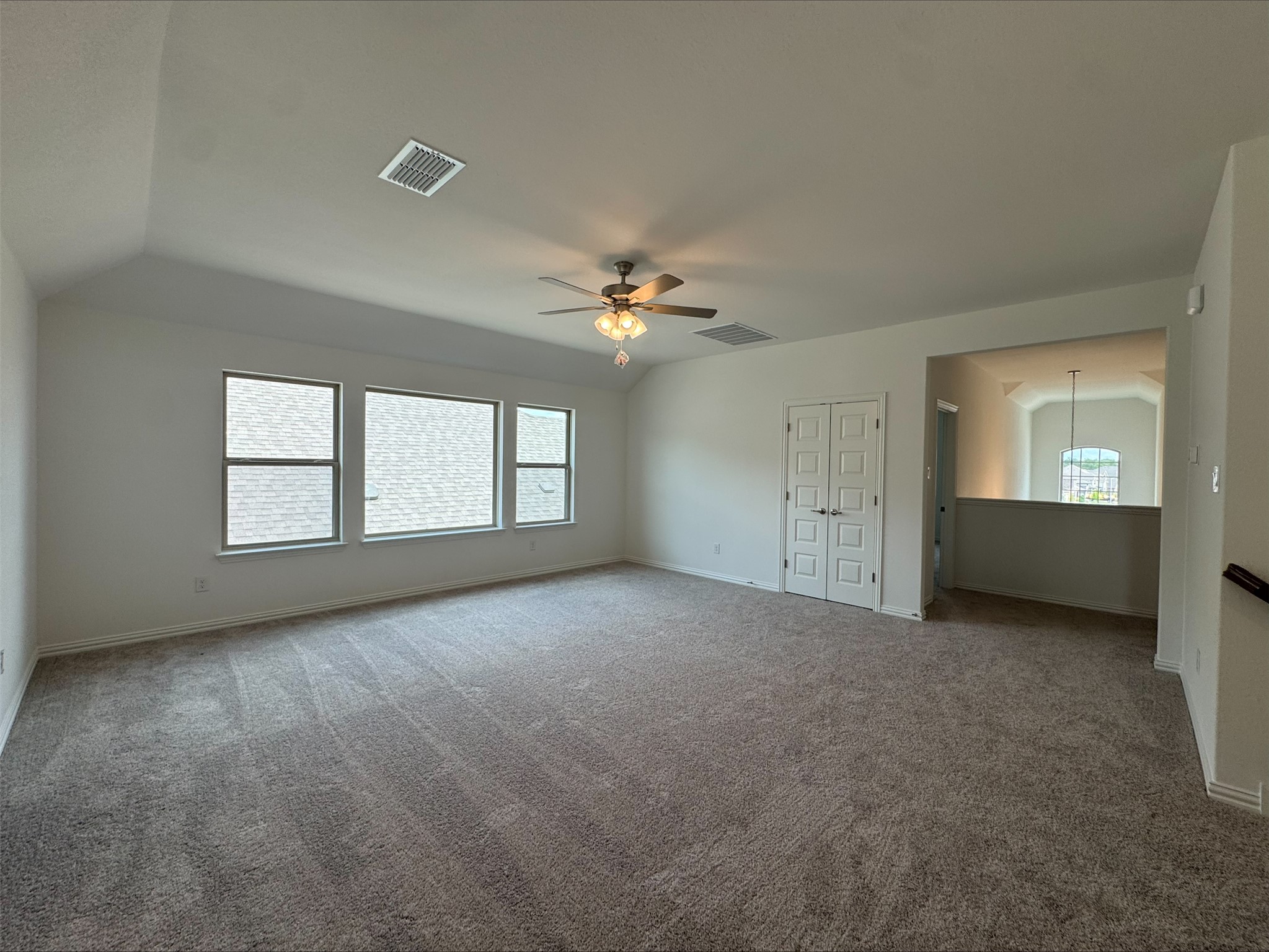 548 Tubman Drive Kyle, TX 78640 - Photo 5 of 13 a view of a livingroom with a ceiling fan and window