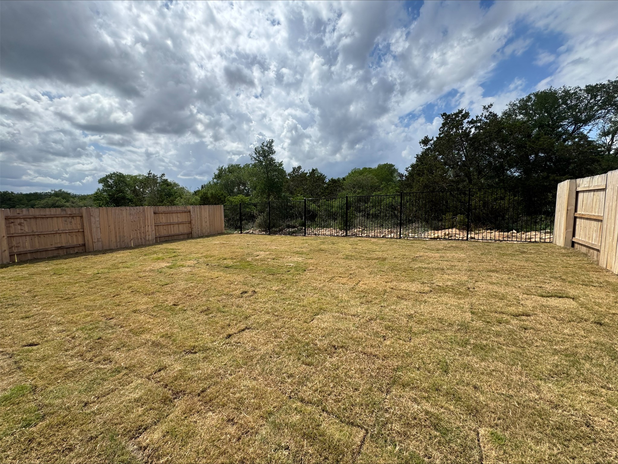 548 Tubman Drive Kyle, TX 78640 - Photo 9 of 13 a swimming pool with outdoor space