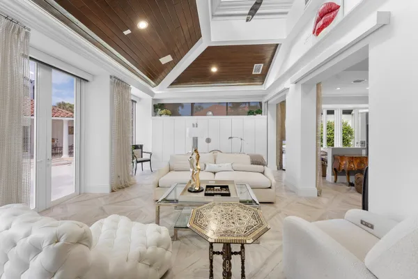 a bathroom with a granite countertop toilet sink and a bathtub