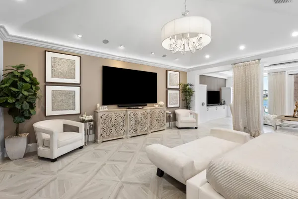 a view of a room with wooden floor and windows